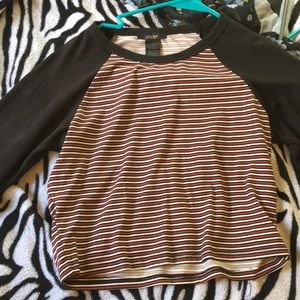 a black and dark red stripped crop top